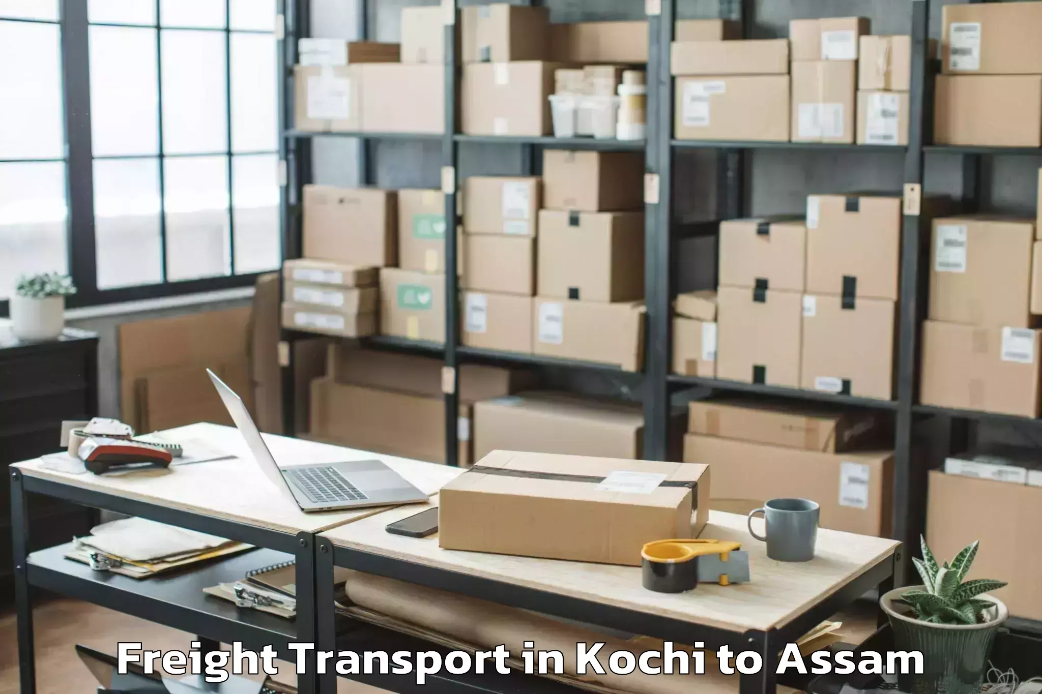 Book Kochi to Khoirabari Freight Transport